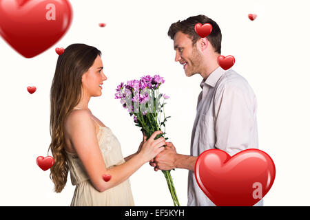 Image composite de side view of couple holding Flowers Banque D'Images