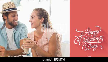 Image composite de l'heureux couple enjoying coffee and cake Banque D'Images