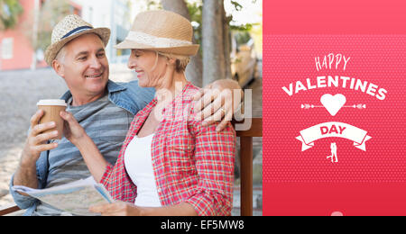 Image composite de l'heureux couple drinking coffee sur un banc dans la ville Banque D'Images