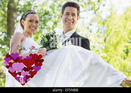Image composite du marié exerçant son épouse dans le jardin Banque D'Images