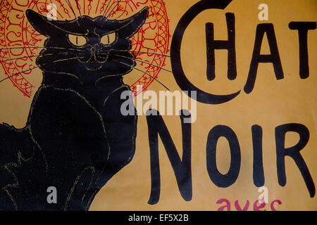 Affiche française montrant une figure de dessin animé d'un chat noir sur fond jaune avec les mots Chat Noir Banque D'Images