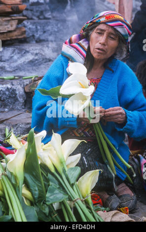 La vente de fleurs sur les marches de l'église de Saint Thomas Banque D'Images