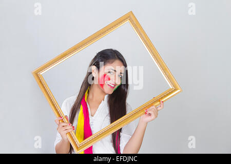 1 dame indien holi Festival Photo Frame Banque D'Images