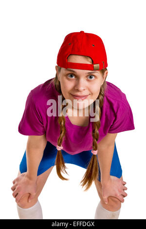 Une fille avec bonnet rouge isolé sur le livre blanc Banque D'Images