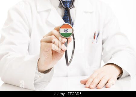 Doctor holding stethoscope with flag series - Inde Banque D'Images