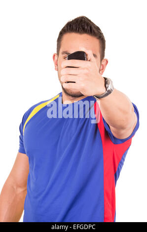 Fan de foot portant des T-shirt bleu Banque D'Images