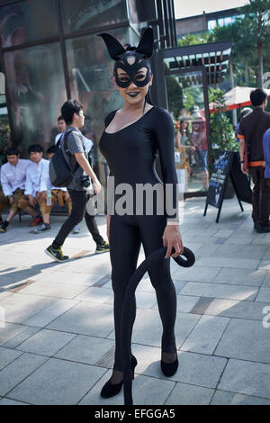 Thaïlande transsexuelle vêtue comme femme de chat lors d'un défilé de rue. Pattaya Thaïlande S.E. Asie Banque D'Images