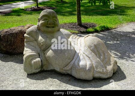 Hotei, dieu du bonheur, à Morikami Jardins Japonais, Delray Beach, Palm Beach County, Floride Banque D'Images