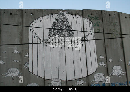 Un graffiti de noël entourée par la barrière de séparation, Bethléem Banque D'Images