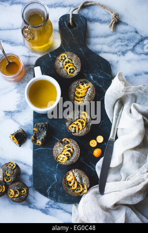 Kumquat et gâteaux de sésame noir Banque D'Images