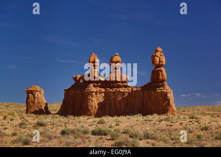 Three Sisters Hoodoos dans le parc national de Goblin Valley, Utah, États-Unis Banque D'Images