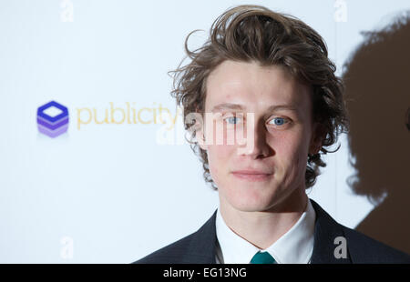 Royaume-uni : l'acteur britannique George MacKay pose pour des photos sur le tapis rouge, comme il arrive pour la 34e London Critics Circle Film Awards à Londres le 2 février 2014. Banque D'Images