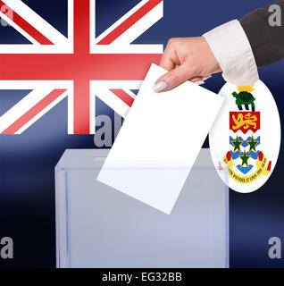Vote au scrutin électoral, sous le drapeau des Îles Caïmanes Banque D'Images