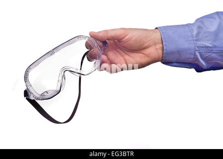 Travailleur homme's hand holding des lunettes de protection. Partie d'une série d'images avec des outils de bricolage pour la maison de l'emploi et de l'artisanat Banque D'Images