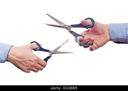 Travailleur homme's hand holding des ciseaux. Partie d'une série d'images avec des outils de bricolage pour la maison de l'emploi et de l'artisanat dans la main isolé Banque D'Images