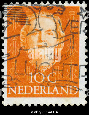 Pays-bas - circa 1949 : timbre imprimé aux Pays-Bas, spectacles portrait de la reine Juliana, monogramme et la couronne sans inscript Banque D'Images