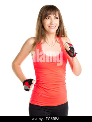 L'exécution de fitness petite fille isolée sur fond blanc. Smiling athletic woman jogging Banque D'Images