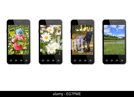 Quatre téléphones modernes avec des images colorées isolé sur fond blanc Banque D'Images