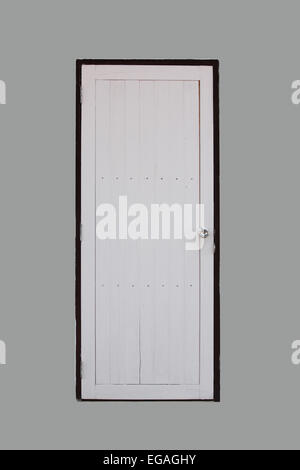 Porte en bois blanc sur fond gris. Banque D'Images