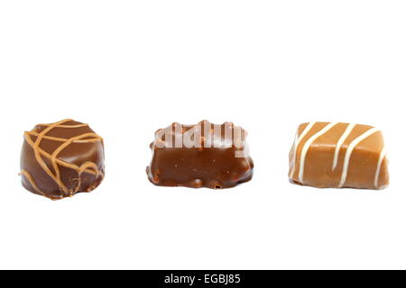 Trois différents types de confiseries au chocolat isolated on white Banque D'Images