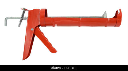 Pistolet à colle silicone rouge isolé sur blanc. Banque D'Images