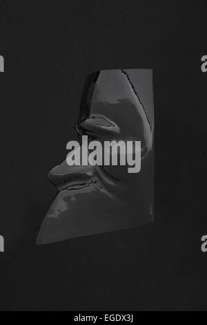 Carnival mask noir brillant noir sur profil Banque D'Images