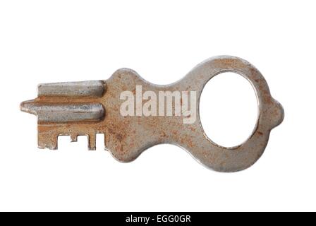 Old rusty key isolé sur fond blanc Banque D'Images