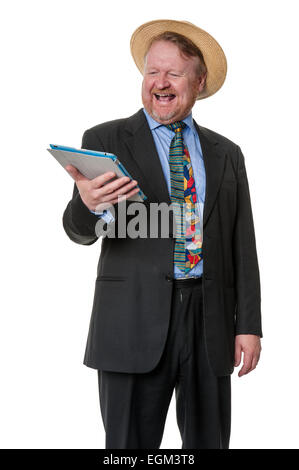 Homme heureux en costume et chapeau de paille holding tablet computer, isolated on white Banque D'Images