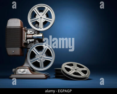 Cinéma, Vidéo concept. Projecteur de film film vintage et moulinets sur fond bleu. 3d Banque D'Images