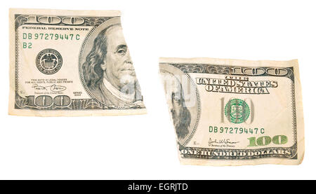 Un one hundred dollar bill coupé en deux isolé sur fond blanc Banque D'Images