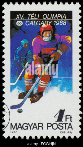 Hongrie - circa 1987 : timbre imprimé dans la Hongrie présente le hockey, Jeux Olympiques d'hiver de 1988, Calgary, Canada, vers 1987 Banque D'Images