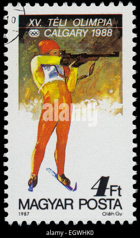 Hongrie - circa 1987 : timbre imprimé dans la Hongrie montre le biathlon, Jeux Olympiques d'hiver de 1988, Calgary, Canada, vers 1987 Banque D'Images