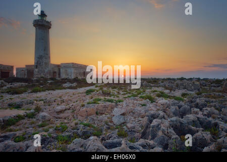 Phare au coucher du soleil Banque D'Images