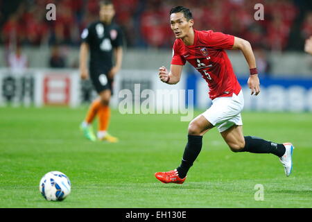 Saitama, Japon. 4e Mar, 2015. Tomoaki Makino (rouges) Football/soccer : Ligue des Champions de l'AFC 2015 match du groupe G entre Urawa Reds 0-1 Brisbane Roar FC à Saitama Stadium 2002 à Saitama, Japon . © Sho Tamura/AFLO SPORT/Alamy Live News Banque D'Images