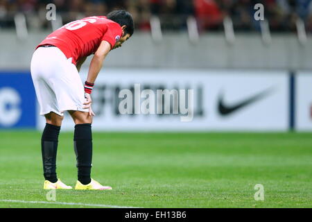 Saitama, Japon. 4e Mar, 2015. Ryota 007 (rouge) : Football/soccer Ligue des Champions de l'AFC 2015 match du groupe G entre Urawa Reds 0-1 Brisbane Roar FC à Saitama Stadium 2002 à Saitama, Japon . © Sho Tamura/AFLO SPORT/Alamy Live News Banque D'Images