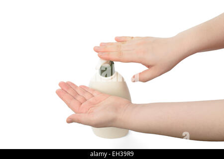 Bouteille de lotion pour le corps de pompage, isolated on white Banque D'Images