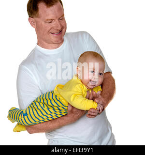 Portrait of Father Holding Baby Boy, Studio Shot Banque D'Images