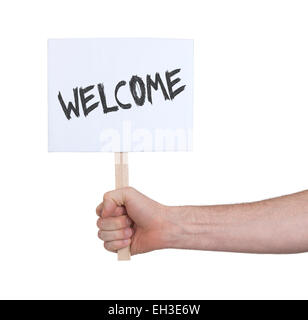 Hand holding sign, isolé sur blanc - Bienvenue Banque D'Images