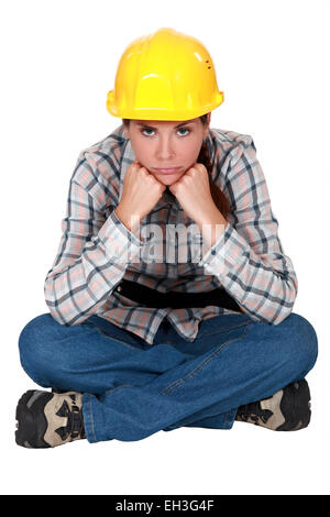 Gloomy female construction worker Banque D'Images