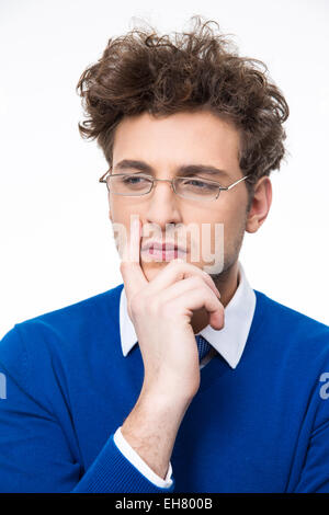 Pensive young businessman dans les verres à la suite Banque D'Images