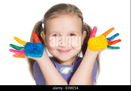 Smiling little girl avec mains peint Banque D'Images