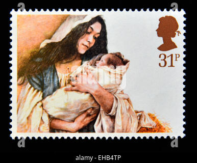 Timbre-poste. La Grande-Bretagne. La reine Elizabeth II. 1984. Noël. Vierge à l'enfant. 31p. Banque D'Images