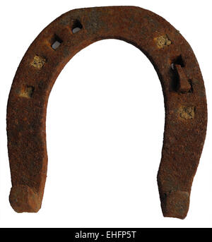 Old rusty horse shoe isolé sur fond blanc, symbole de chance Banque D'Images