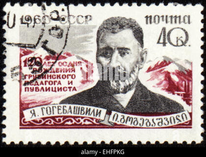 Urss - VERS 1960 : poster de timbres en URSS et montre portrait de pédagogue géorgien et publiciste Gogebashvili Banque D'Images