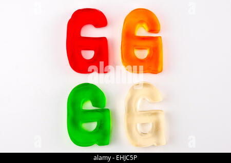Un ensemble de quatre lettres de gomme en forme de G isolated on white Banque D'Images