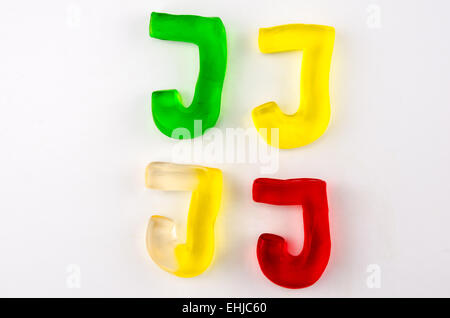 Un ensemble de quatre lettres de gomme en forme de J isolated on white Banque D'Images