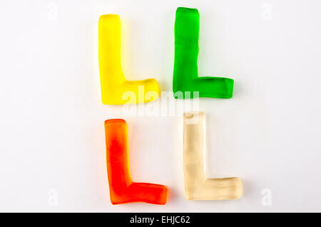Un ensemble de quatre lettres gommeux dans la forme de L isolated on white Banque D'Images
