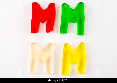 Un ensemble de quatre lettres de gomme en forme de M isolated on white Banque D'Images