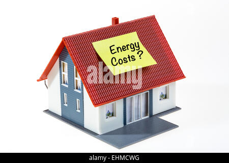Image symbolique, maison avec un Post-it, les coûts de l'énergie Banque D'Images