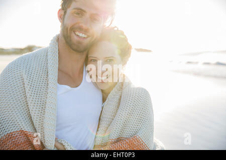 Portrait of young woman standing on beach Banque D'Images